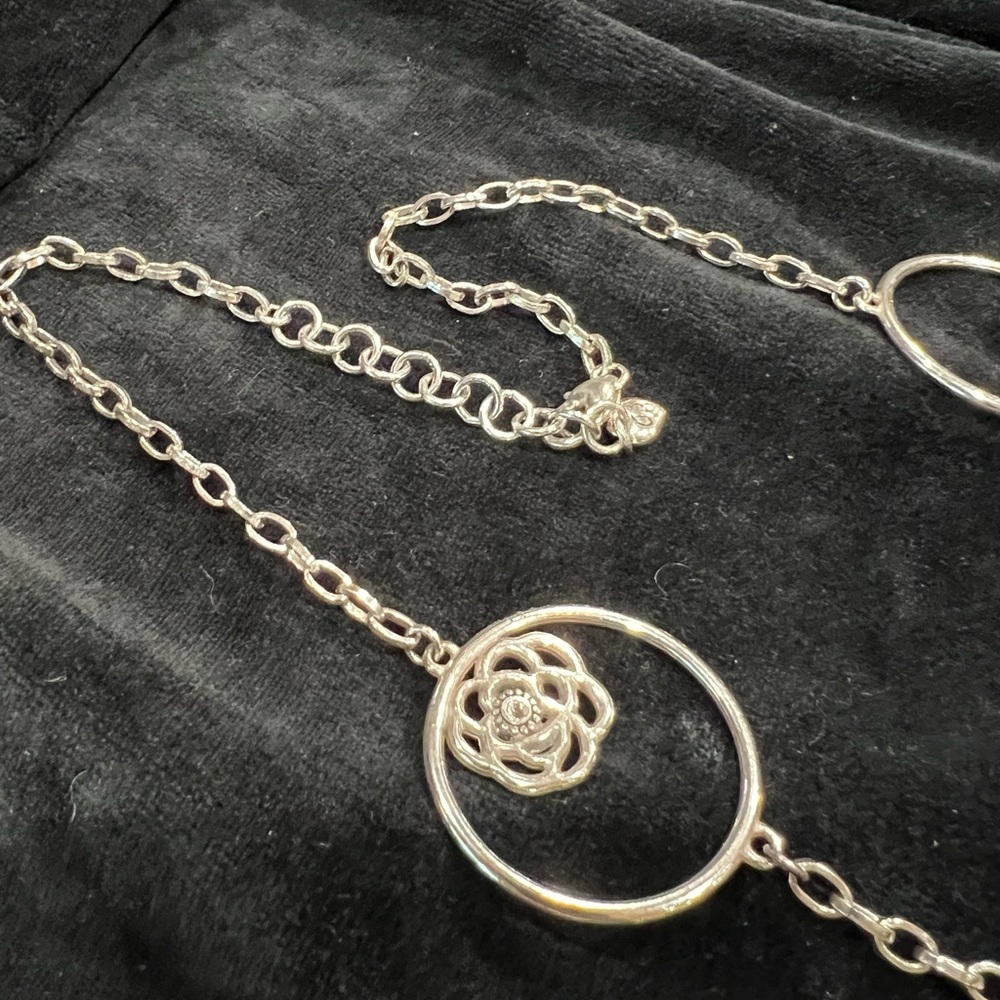 Brighton long silver circle necklace. Approximately 36”